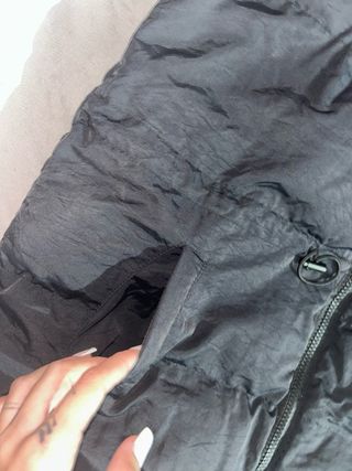 Chaqueton negro sin mangas .