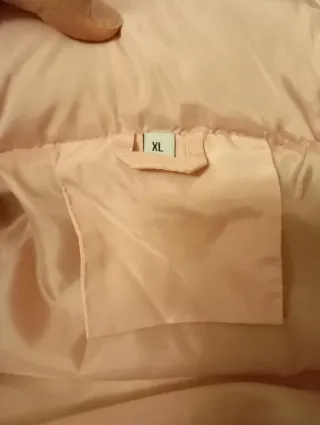 Cazadora invierno tipo plumas rosa