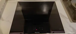 Vitrocerámica Inducción con 18 meses garantía.