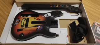 Consola Nintendo Wii+2 mandos+guitarra+tabla+8jueg