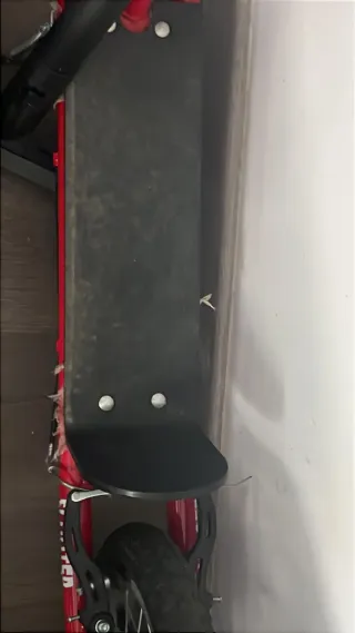 Patinete rojo manual para altura de persona de 150