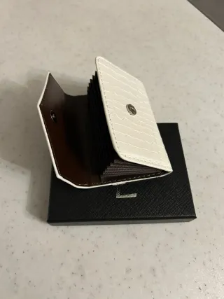 Portafoglio Yves Saint Laurent bianco effetto cocc