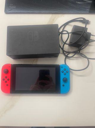 (En perfecto estado) Nintendo Switch + Accesorios