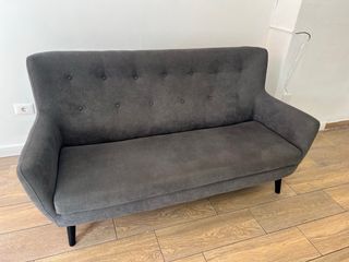 Sofá gris de tela