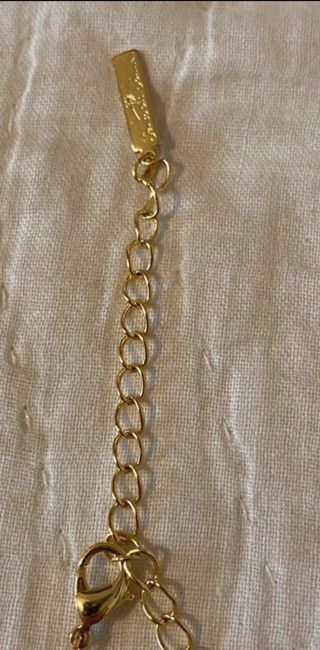 Collana e orecchini, colore dorato con perle.