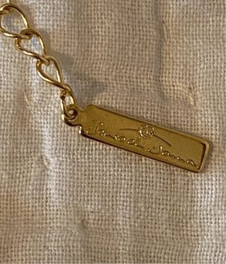 Collana e orecchini, colore dorato con perle.