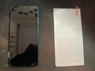 Xiaomi 9C NFC + cristal templado + dos fundas.