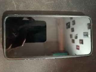 Xiaomi 9C NFC + cristal templado + dos fundas.