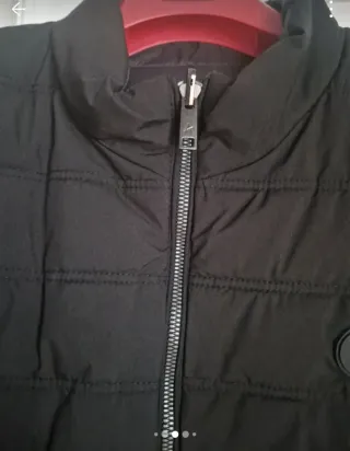 Chaquetón reversible sin mangas, muy buen estado.