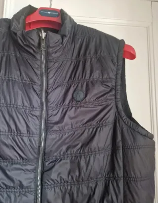 Chaquetón reversible sin mangas, muy buen estado.