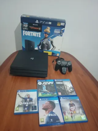 PS4 Pro 1TB + 5 Giochi