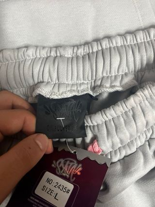 Chándal Syna Central Cee Gris y Rosa S