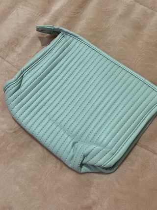 Neceser bolso de aseo viaje azul con etiqueta