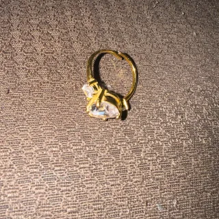 Anillo acero dorado con circonitas