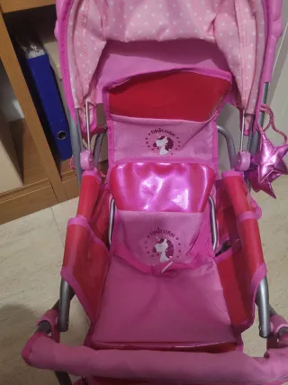 Carrito de muñecas rosa