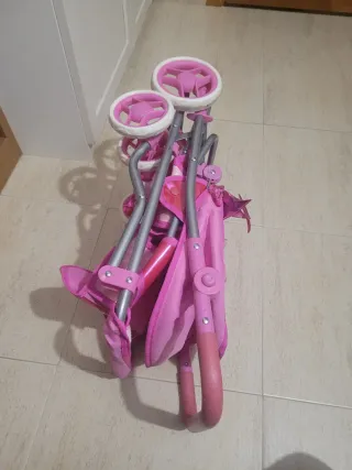 Carrito de muñecas rosa