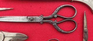 Lotto di 7 forbici antiche