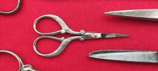 Lotto di 7 forbici antiche