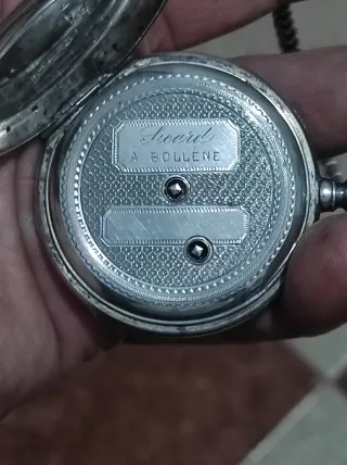 Bonito reloj de bolsillo antiguo de plata con llav