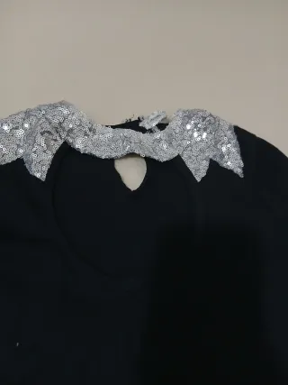 Vestito elegante nero con dettagli argento