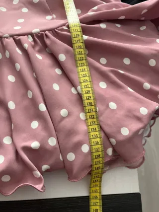 Traje de flamenca rosa empolvado con lunares