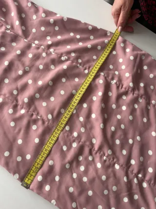 Traje de flamenca rosa empolvado con lunares