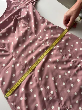 Traje de flamenca rosa empolvado con lunares