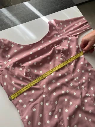 Traje de flamenca rosa empolvado con lunares