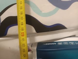 Tabla de planchar con funda.