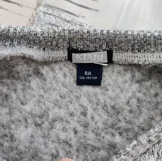 Jersey niño talla 8Y gris jaspeado