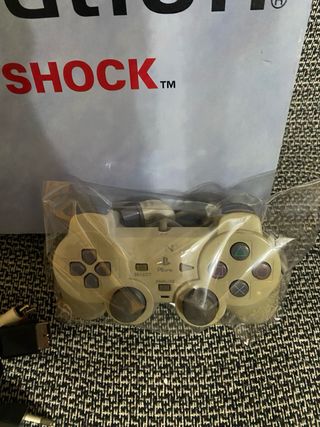 PlayStation 1 con caja completa