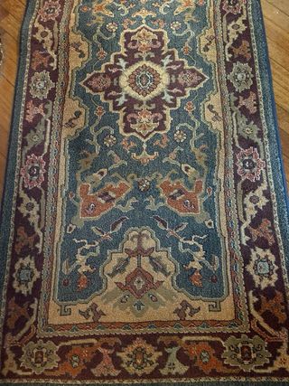 Alfombra persa de lana azul y roja