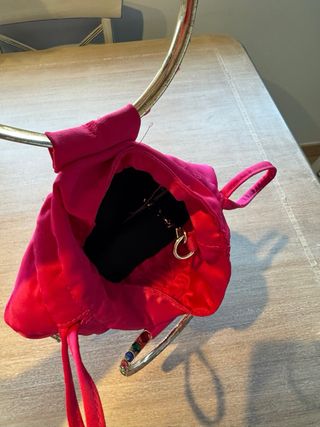 Bolso fiesta fucsia con asa de piedras