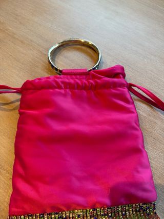 Bolso fiesta fucsia con asa de piedras