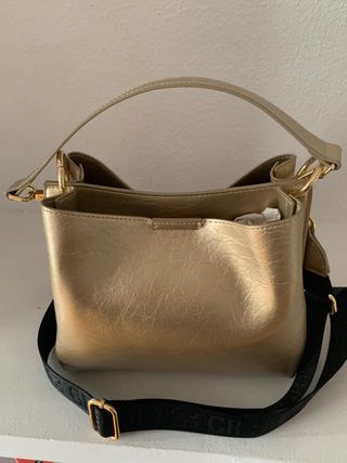 Bolso dorado marca Georges Rech