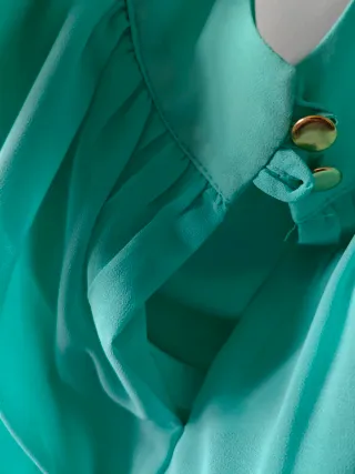 Vestido turquesa cadena dorada Special Events