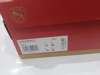 Scarpe da calcio Puma bianche e arancio