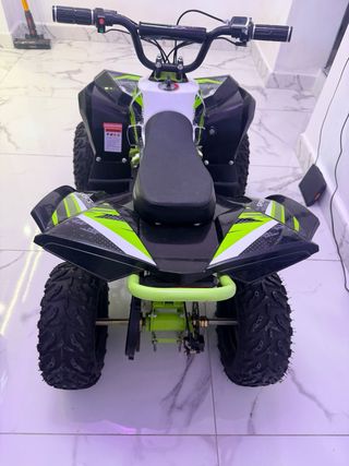 Quad eléctrico infantil verde y blanco