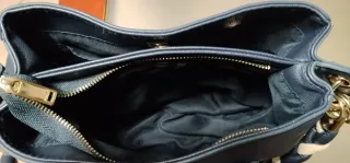 Borsa blu con manici intrecciati