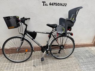 Bicicleta urbana con silla para niño