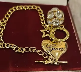 Pulsera Guess Corazón y Estrella Dorada