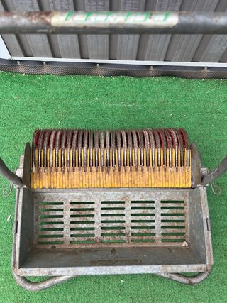 Máquina antigua para aceitunas