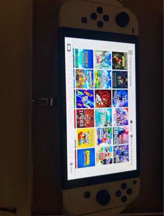 Nintendo Switch OLED Blanca. Con mandos hori