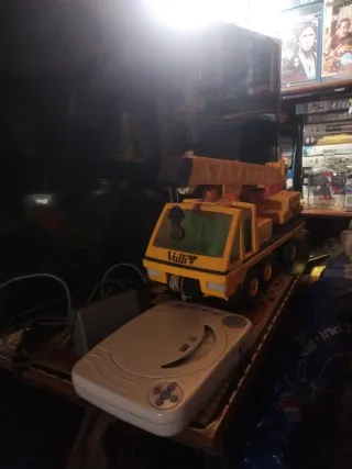 Lote de juguetes: grúa y consola