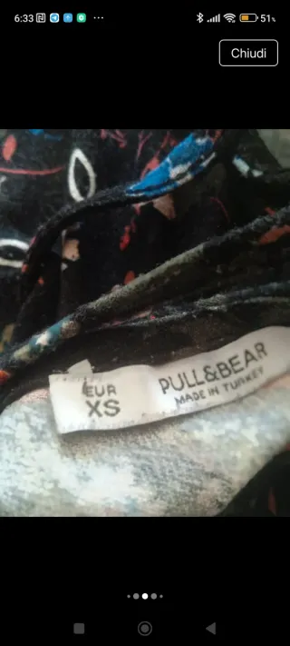 Miniabito con incrocio posteriore