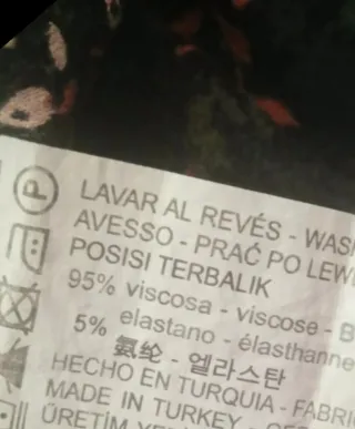 Miniabito con incrocio posteriore