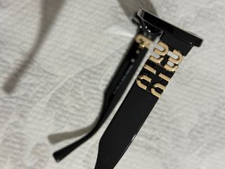 Gafas de sol Miu Miu negras