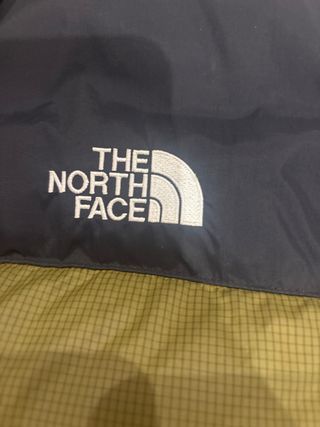 Chaqueta The North Face verde y negra