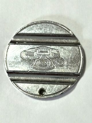 Gettone telefonico ESM 7509 raro in nichel e foro