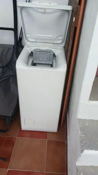 Lavadora blanca carga superior